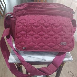 Lug "Wings" cross body bag. 12x9 inches . One blue one left